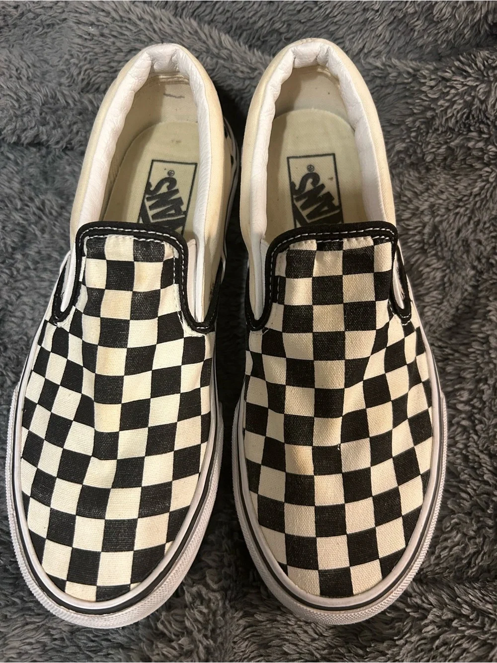 Vans Checkerboard Slip-On Sneakers in Black and White